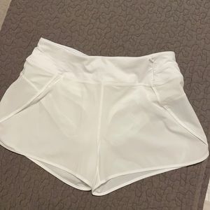 Valiant white lined running shorts.  Size medium.